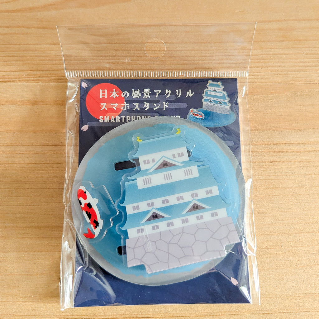 Originalverpackung des Acryl-Smartphone-Ständers mit japanischer Beschriftung und transparentem Sichtfenster